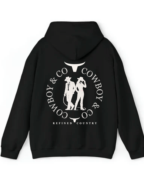 Hoodie noir au dos le logo Le Duo C&C deux silhouettes — un cowboy et une cowgirl encadrées par deux têtes de longhorn stylisées et le texte “COWBOY & CO – REFINED COUNTRY