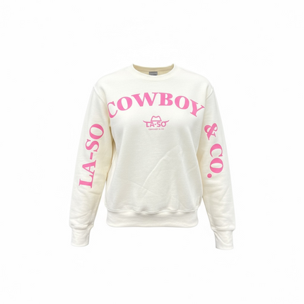 Un chandail ivoire à manches longues avec le texte rose LA-SO COWBOY & CO. à l'avant sur le devant et les manches. Le logo central LA-SO est surmonté d’un chapeau cowboy stylisé rose. 