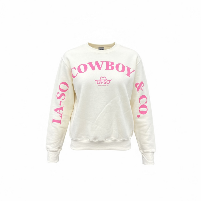 Un chandail ivoire à manches longues avec le texte rose LA-SO COWBOY & CO. à l'avant sur le devant et les manches. Le logo central LA-SO est surmonté d’un chapeau cowboy stylisé rose. 